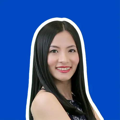 Lili Hao, native Mandarin instructor and ChineseFor.Us founder - professional headshot showing welcoming smile against blue background - learn Chinese online with expert teacher